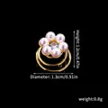 Detail of bridal pearl hair spiral clip with dimensions and rhinestones on black background - 11# Golden 5 Pearl Flower
