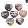 Set of 7 polished heart-shaped rhodonite crystal stones in pink and black patterns - Rhodonite