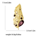 Spilla foglia dorata con strass viola e goccia di cristallo, gioiello da 7,1cm di lunghezza - Pietra Viola Base Oro