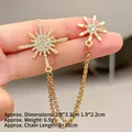 Detalle de broches de estrella dorados con cristales brillantes y cadenas dobles finas - TL24076-Nueva Estrella Pequeña