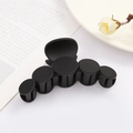 Matte black oversized hair claw clip for women on minimalist white background - Black Matte Arc(FJ247)