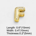 Macro view of gold letter F pendant with pave cubic zirconia and size dimensions - Letter F
