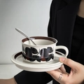 Hand-painted vintage ceramic coffee cup and saucer set with black and brown leaf patterns - Brown (Decal)