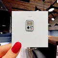 Cute white cartoon game console enamel pin with colorful buttons on display card - 110*Game Boy Console Smile Pin