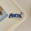 Detalle de una linda pinza para el pelo de gato azul marino con puntos blancos - Azul