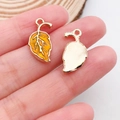Golden metal leaf charms with orange enamel finish for DIY jewelry and earrings - Leaf
