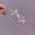 Elegant gold star headband for women featuring crystal rhinestones and pearl accents - Star