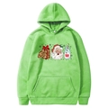 Green Christmas hoodie for couples with gingerbread and Santa Claus festive prints - S / Fruit Green
