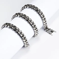 Classic silver titanium steel Cuban chain bracelet displayed on a white cylinder - 10mm/45cm Necklace / Steel
