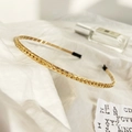 Elegant golden metal chain headband accessory for women on white soft fabric background - Gold Minimalist Chain