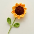Handmade crochet sunflower with bright yellow petals and green leaves on white background - Sunflower (Finished) / Golden Yellow (Double Leaf with Wire)