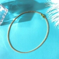 Elegant gold tennis necklace with white zircons on blue silk background for women - Necklace / Gold Necklace 2mm