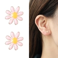 Pink enamel daisy stud earrings with yellow centers shown on white and on a model - Pink Daisy Stud Earrings(NCE07209-1)