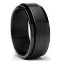 Macro detail of men's matte black rotatable ring with brushed finish and polished edges - Matte Black Spinner