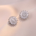Sparkling silver sunflower earrings with zircon stones on pink silk background - Steel Earrings (E0675) / Steel