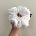 Hand holding a premium white double-layer lace scrunchie with fringe details - Q697-2 White Distressed Fringe