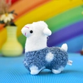 Close-up of adorable blue and white plush llama keychain with soft curly fur texture - Curly Alpaca / 12cm / Blue