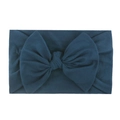 Soft nylon baby headband featuring an oversized dark navy blue bow on white background - Navy