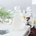 Minimalist transparent resin Christmas tree desk ornament on a white book base - 23 Clear Quartz