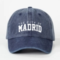 Detail of washed navy baseball cap featuring white vintage Madrid city embroidery texture - Adjustable / Navy Blue