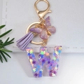 Letter W purple crystal resin keychain with colorful sequins and tassel accessory - Letter W