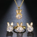 Rotating rabbit jewelry set in gold with white enamel and sparkling zircon stones - Rotating Rabbit Three-Piece Set (9003)