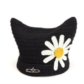 Detail of black cat ear beanie with white daisy patch and silver cross safety pin - White Daisy Cat Ear Style / Black & White