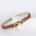 Slim brown PU leather belt for women featuring a stylish gold bow metal buckle - Camel