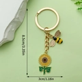 Golden sunflower and bee keychain with enamel finish and dimensional size markings - Long Sunflower Bee
