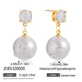 Detail view of gold-plated stainless steel earrings with pearl and cubic zirconia accents - Gold White Pearl Drop Style (JDE0108006)