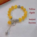 Ethnic yellow agate bracelet with silver cicada pendant and lotus tassel charms - Yellow Agate: Summer Cicada Song