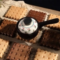 Square walnut wood coaster in biscuit shape with wavy edges for hot coffee mugs and teapots - Walnut Square Biscuit Coaster