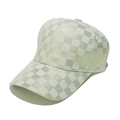 Detail of mint green baseball cap featuring metallic gold checkered pattern on curved brim - Green Gold