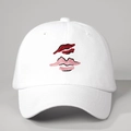 Close-up of white cotton baseball cap featuring detailed red and pink lip embroidery on crown - One Size / White