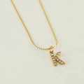 Elegant gold stainless steel necklace featuring a crystal-encrusted letter K pendant - Letter K
