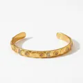 Verstellbares goldenes Edelstahl-Armband mit Sonnenblumenmotiven und klaren Kristallen - Sonnenblumenmuster-Relief (KA1221) / Gold
