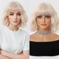 Detail of a light blonde bob wig with bangs showing natural texture and styling - Light gold
