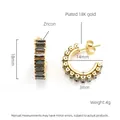 Macro shot of 18K gold plated C-shaped earrings with black zircon and size specifications - Black Zircon / Gold Base / 18K Vacuum Plating / Black (ZE454G)
