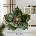 Close-up of 24cm dark green velvet Christmas magnolia flower with gold glitter edges - Green