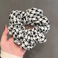 Classic black and white houndstooth pattern cotton hair scrunchie held by hand - 11# Flying Crane White