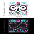 Glow-in-the-dark Day of the Dead face tattoo with pink roses and spider web pattern - Pattern FB-007