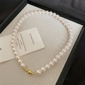 Close-up of gold-plated magnetic clasp on white pearl necklace for women - 60# Gold White 10mm Magnetic Pearl Necklace