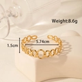 Golden stainless steel interlocking chain link cuff bracelet with an open geometric design - Interlocking Oval Chain