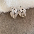 Detail of matte silver C-shaped earrings with three-layer design and black polka dots - 69# Silver Matte Triple Ring Polka Dot C-shape Silver Earring Post