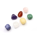 Set of 7 irregular natural crystal yoga stones in various colors on white background - Topaz Style 7 Chakra Stones (7 Loose Stones)