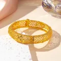 Vintage golden hollow cuff bracelet with intricate butterfly relief and filigree design - Butterfly