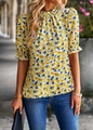 Close-up of yellow floral shirt with ruffled petal sleeves and blue flower print detail - S / Yellow