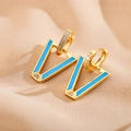 Detail of V-shaped gold earrings with light blue enamel and micro-pave crystals - Blue