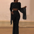 Sparkly black sequin two-piece set featuring long sleeve crop top and flared trousers - Black