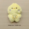 Detail of yellow plush chick doll with embroidered smile and 8cm by 6cm dimensions - Full Body Yellow Chicken